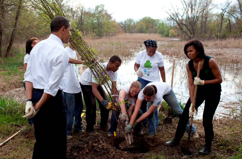 The President and First Lady plant trees in Kenilworth Aquatic Gardens. Source: Pete Souza.